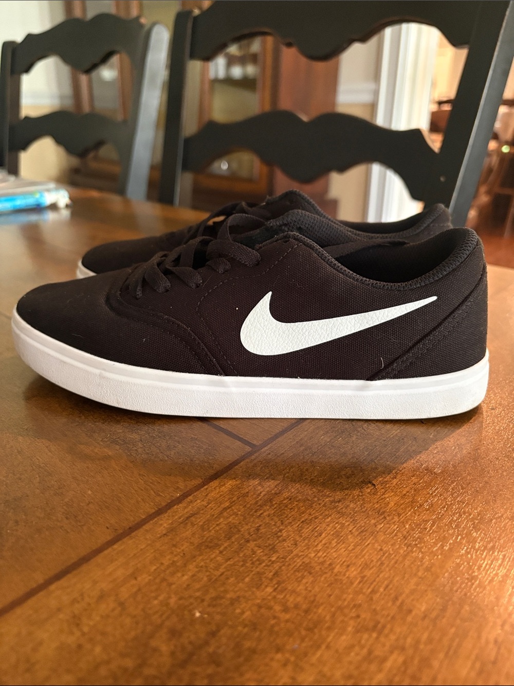 Nike Black Canvas Low-Profile Sneakers with White Swoosh